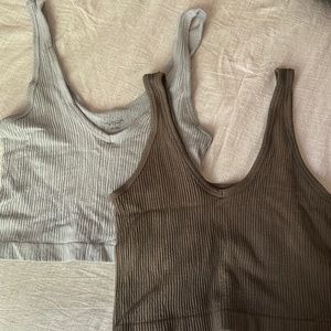 Out from under Urban Outfitters tanks.